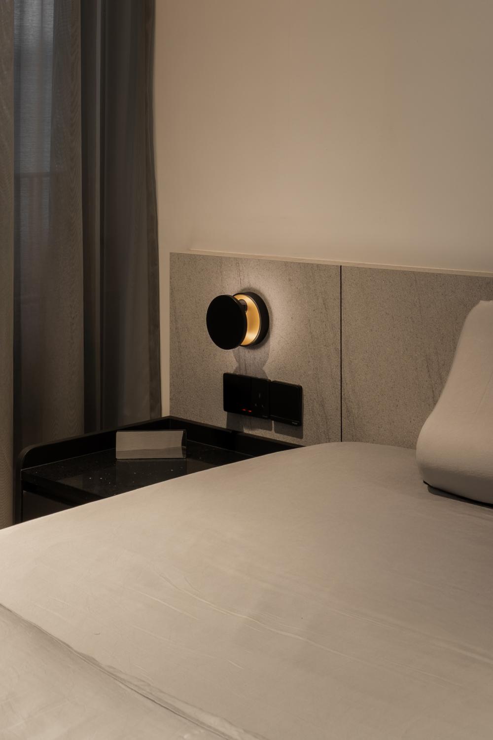 Contemporary Bedroom with Built-in Bed and Bedside Table