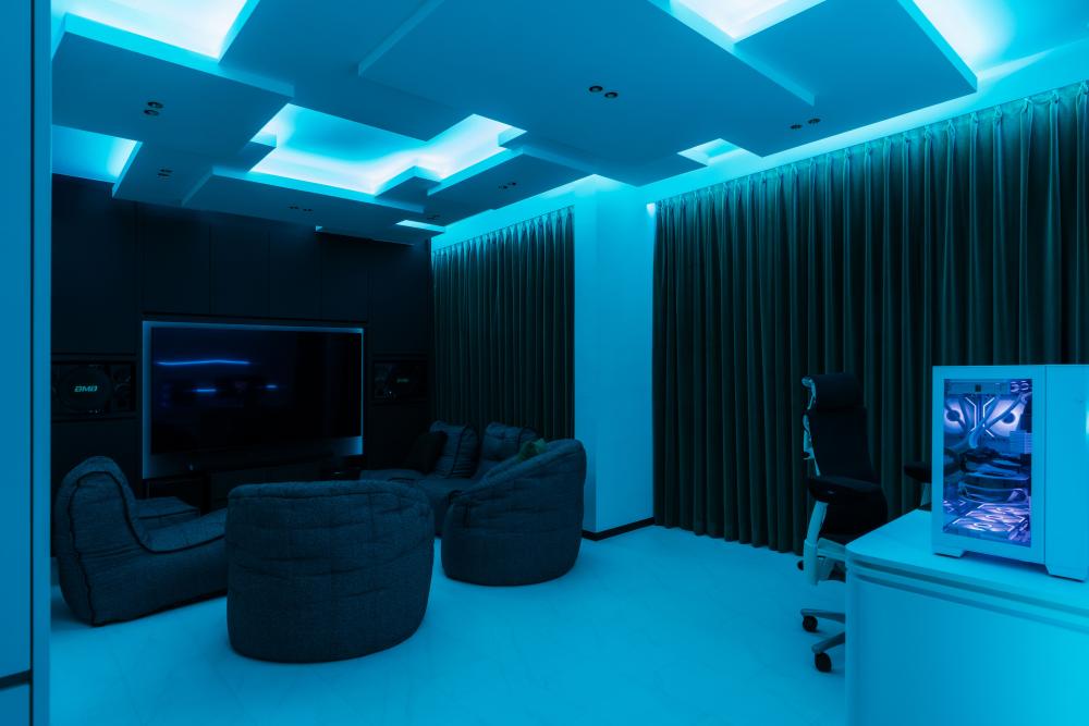 Contemporary Gaming Room with Cove Lighting and Sofa