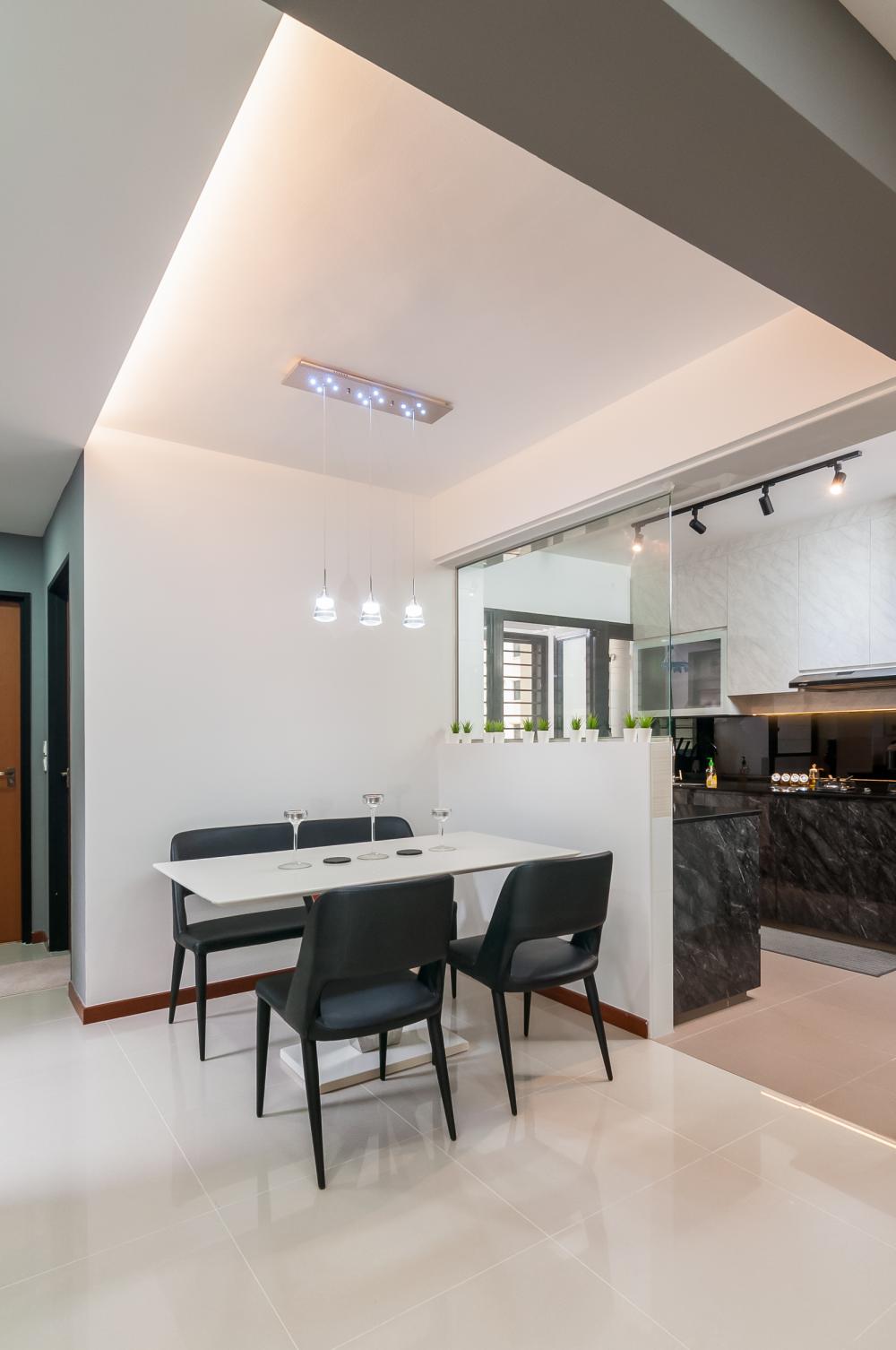 Modern Dining Room with Cove Lighting and Chandelier