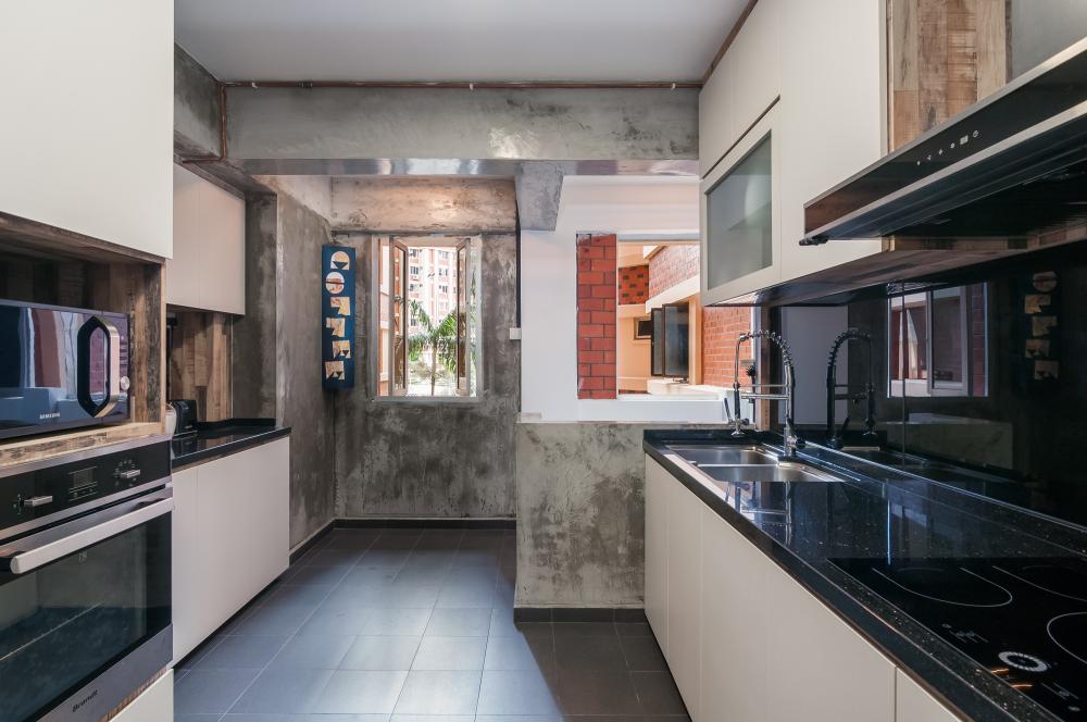 Industrial Kitchen with Countertop and Cement Floor