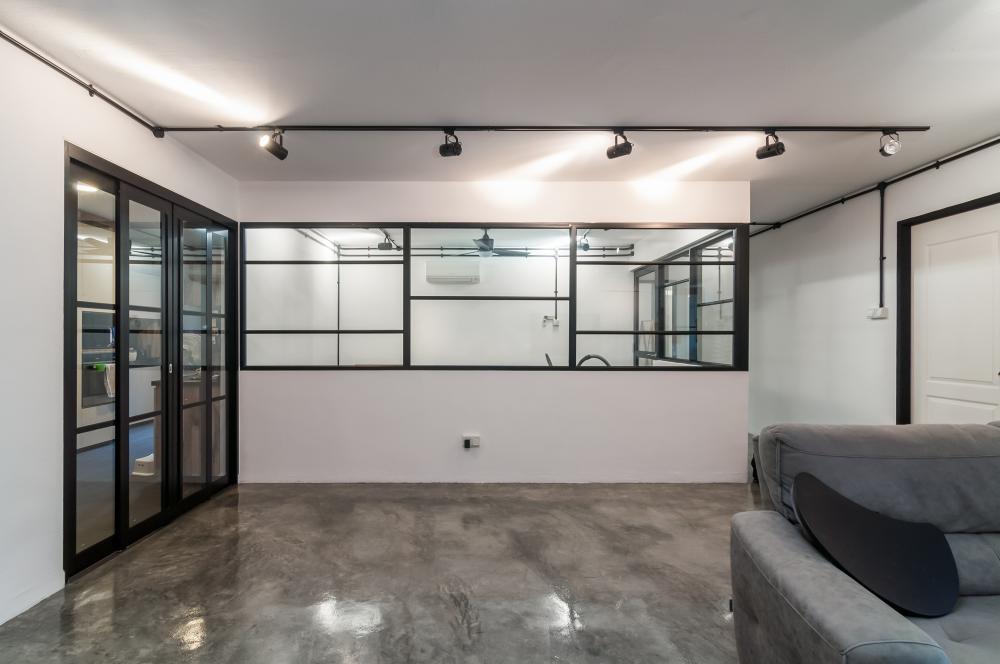 Industrial Living Room with Feature Wall and Ceiling Light
