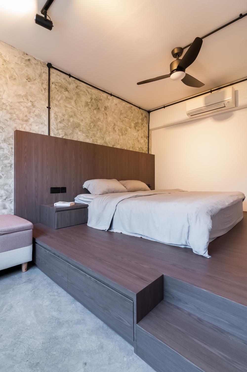 Industrial Bedroom with Platform Bed and Cement Floor