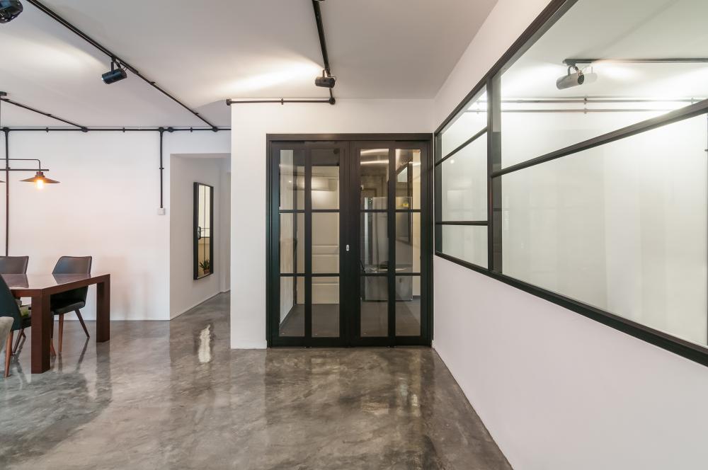 Industrial Living Room with Feature Wall and Mirror