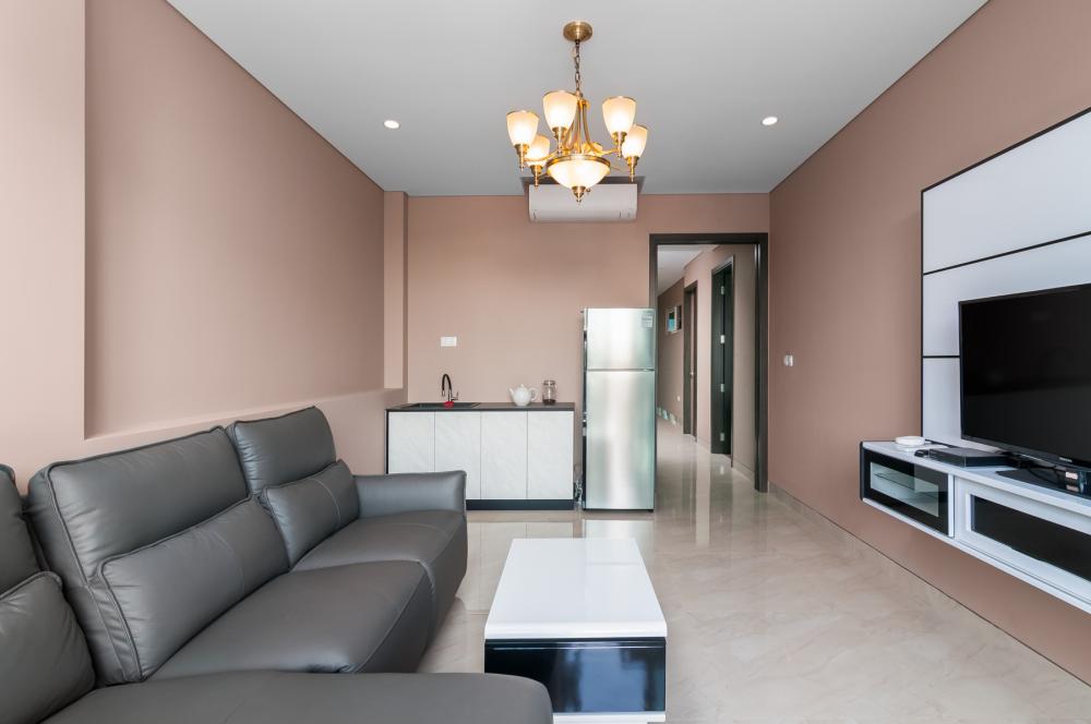 Asian Living Room with Marble Floor and TV Console