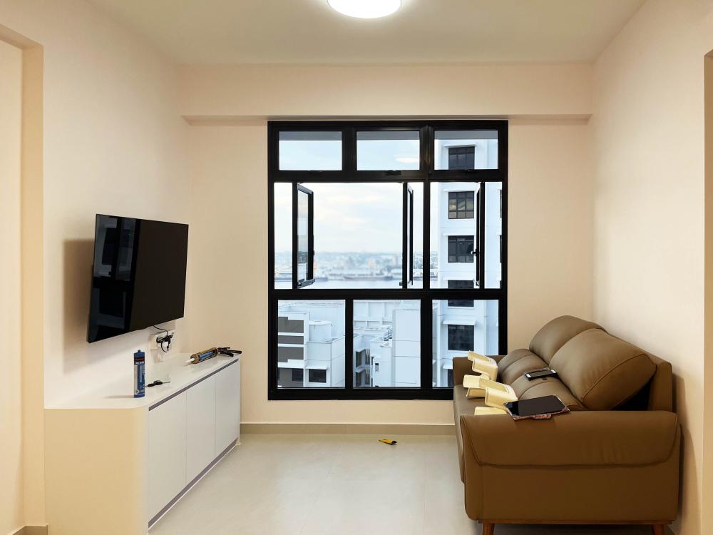 Minimalist Living Room with Bookshelf and Settee