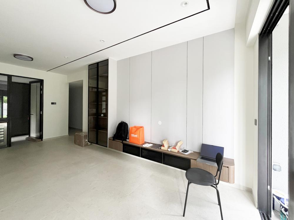 Minimalist Living Room with Bookshelf and Settee