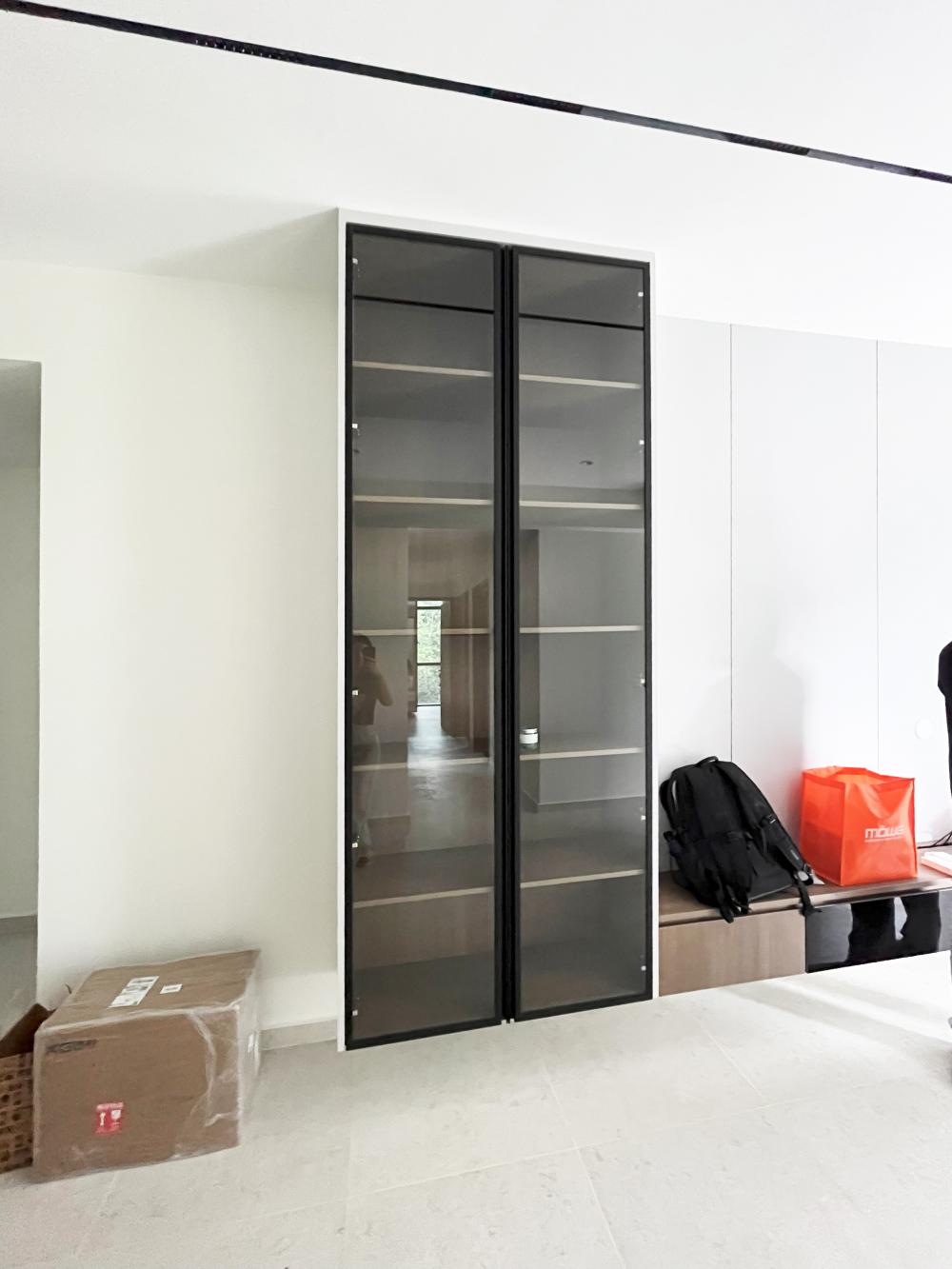 Minimalist Living Room with Cement Floor and Wood Flooring