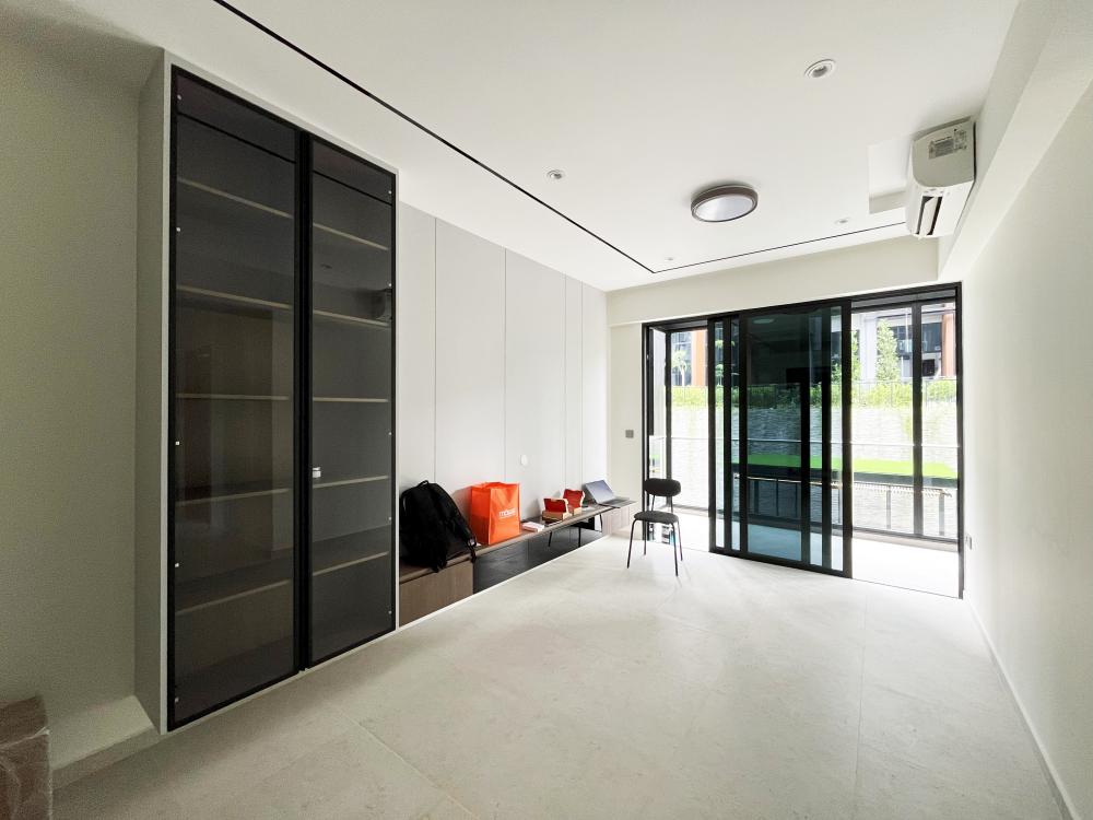 Minimalist Living Room with Bookshelf and Settee