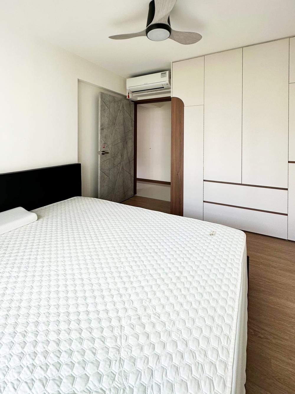 Modern Bedroom with Bookshelf and Platform Bed