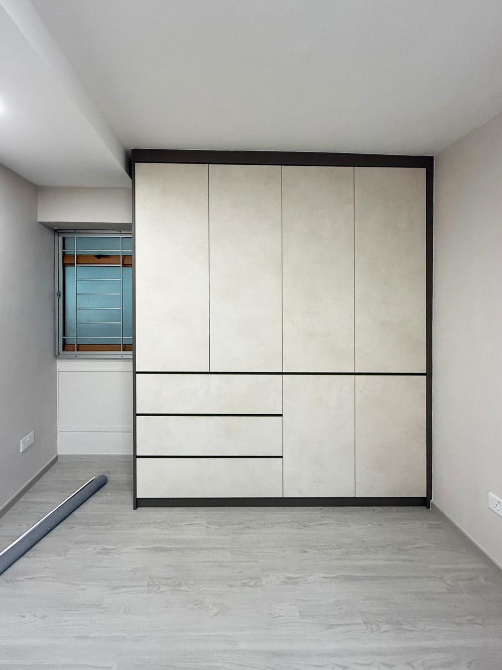 Minimalist Bedroom with Bookshelf and Platform Bed