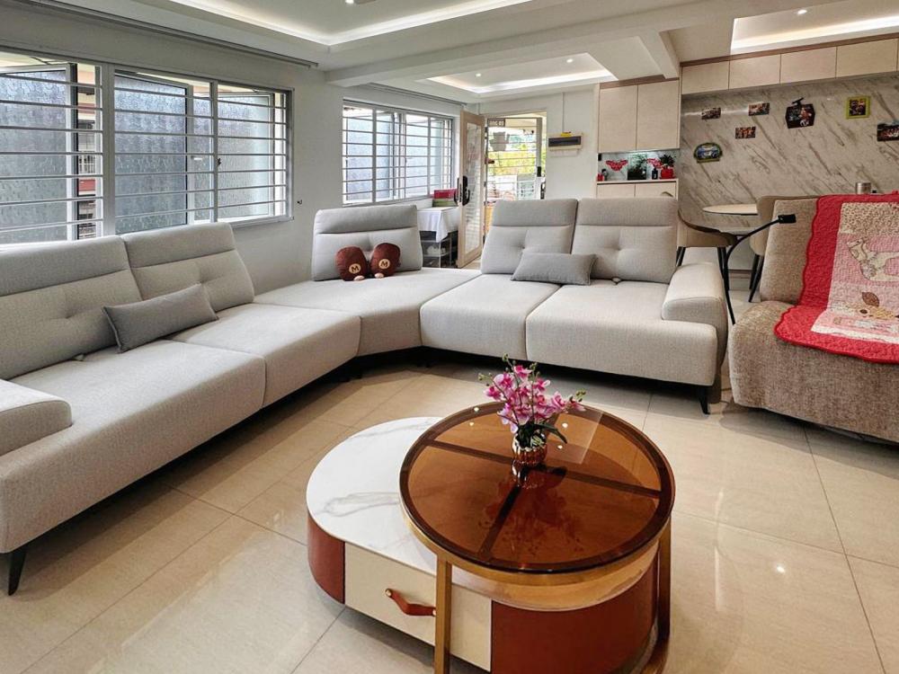 Modern Living Room with Bookshelf and Settee