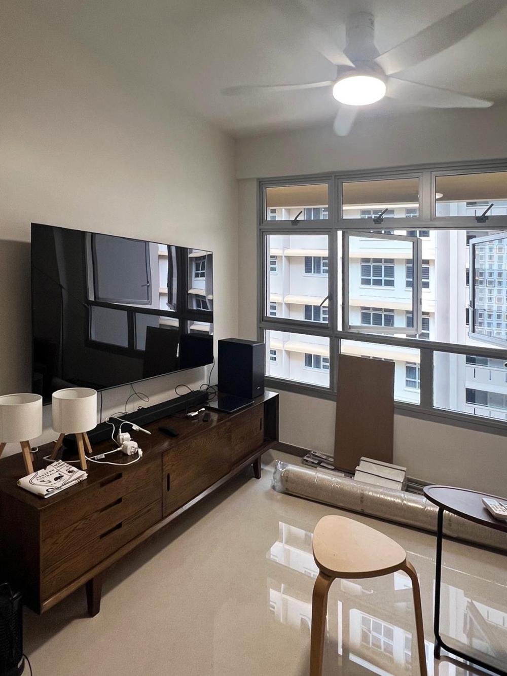 Modern Living Room with Bookshelf and Settee