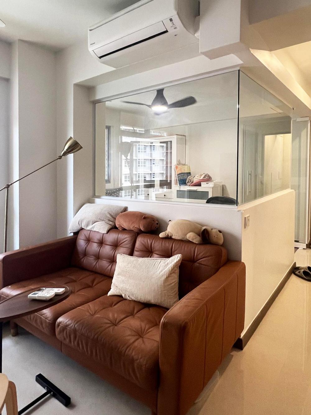 Modern Living Room with Bookshelf and Settee