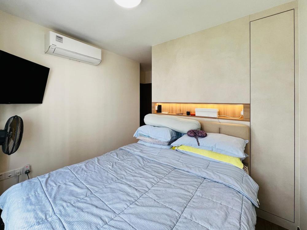 Modern Bedroom with Bookshelf and Platform Bed