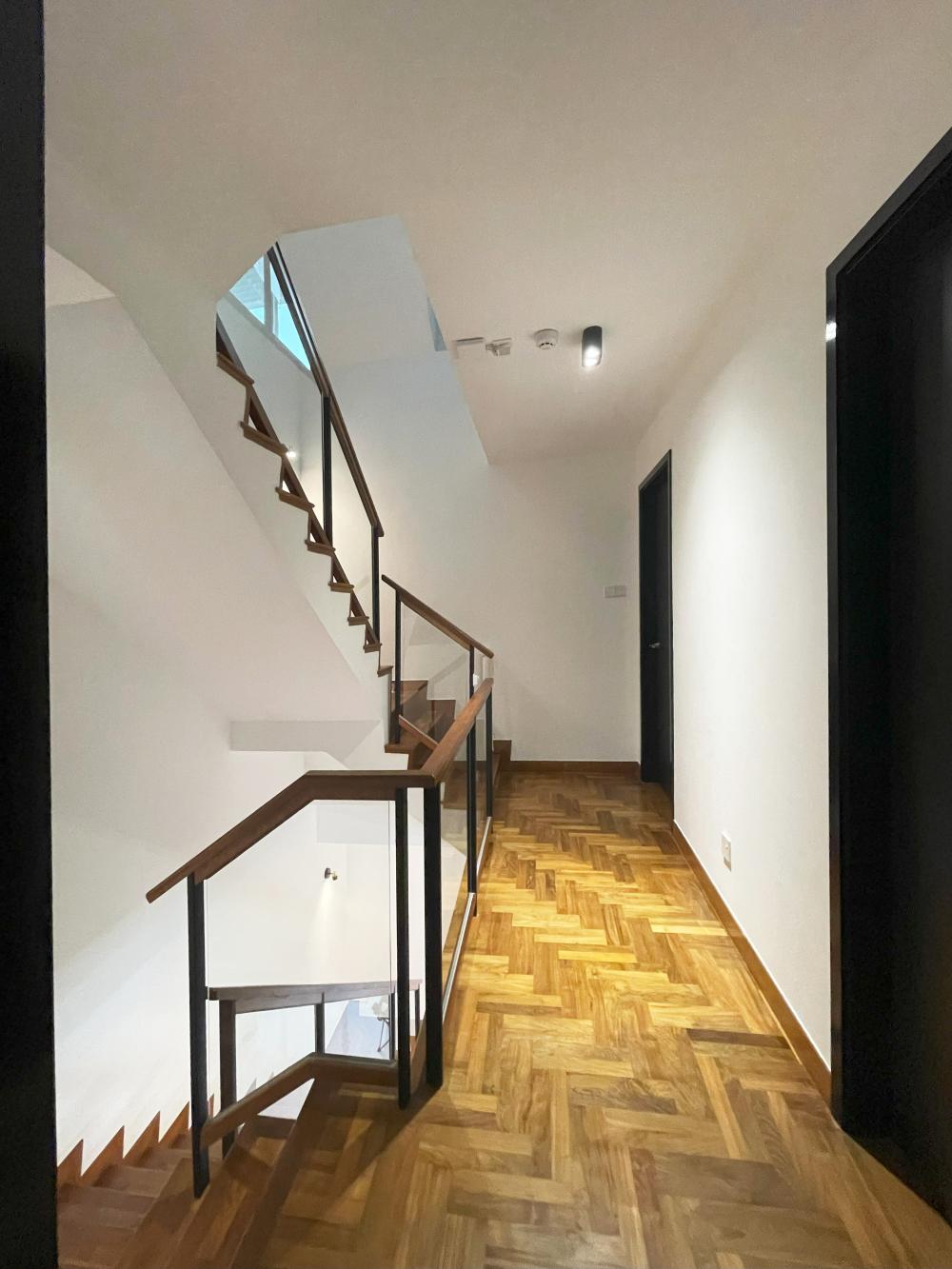 Modern Hallway with Bookshelf and Artwork