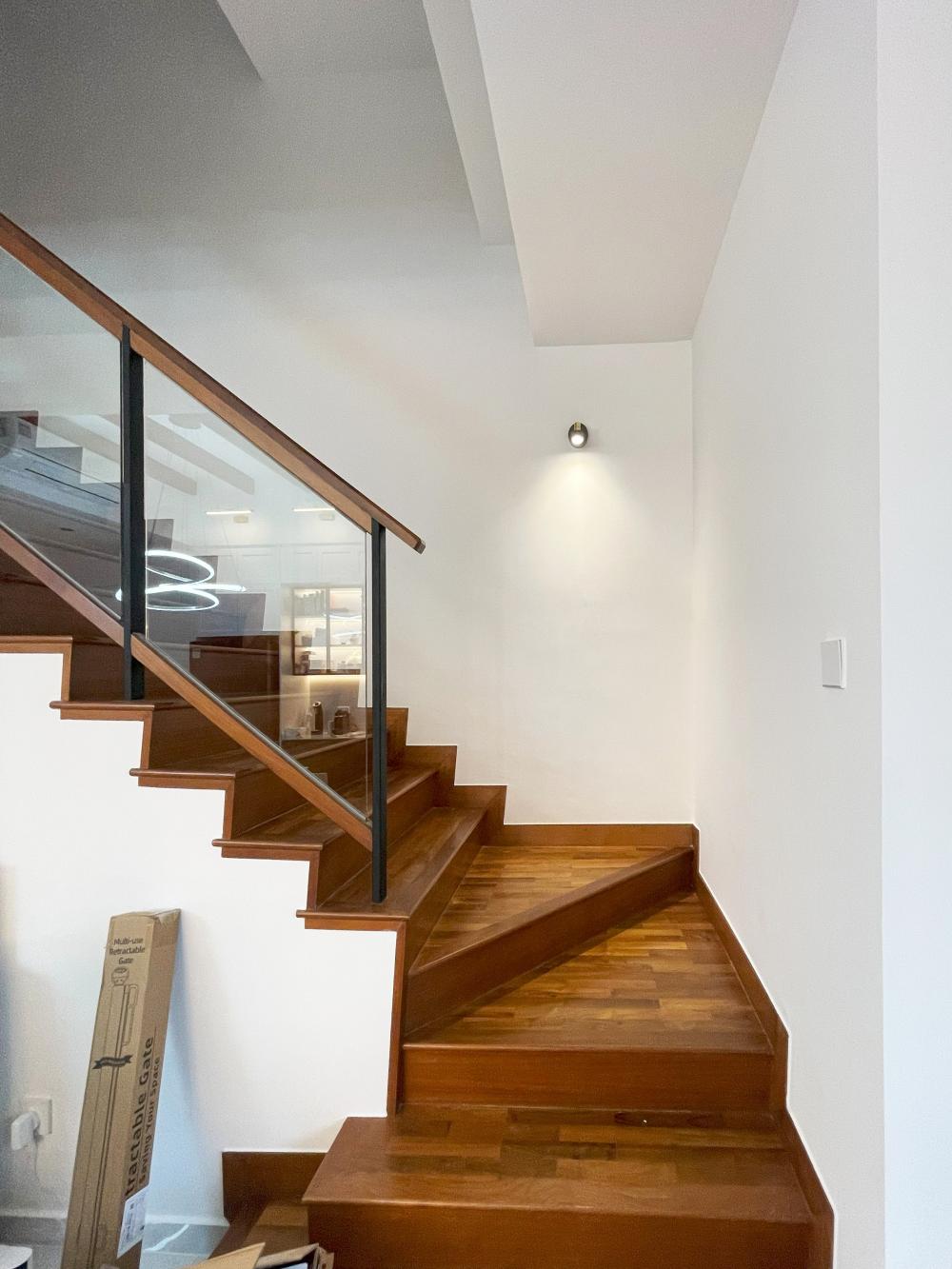 Modern Hallway with Bookshelf and Artwork