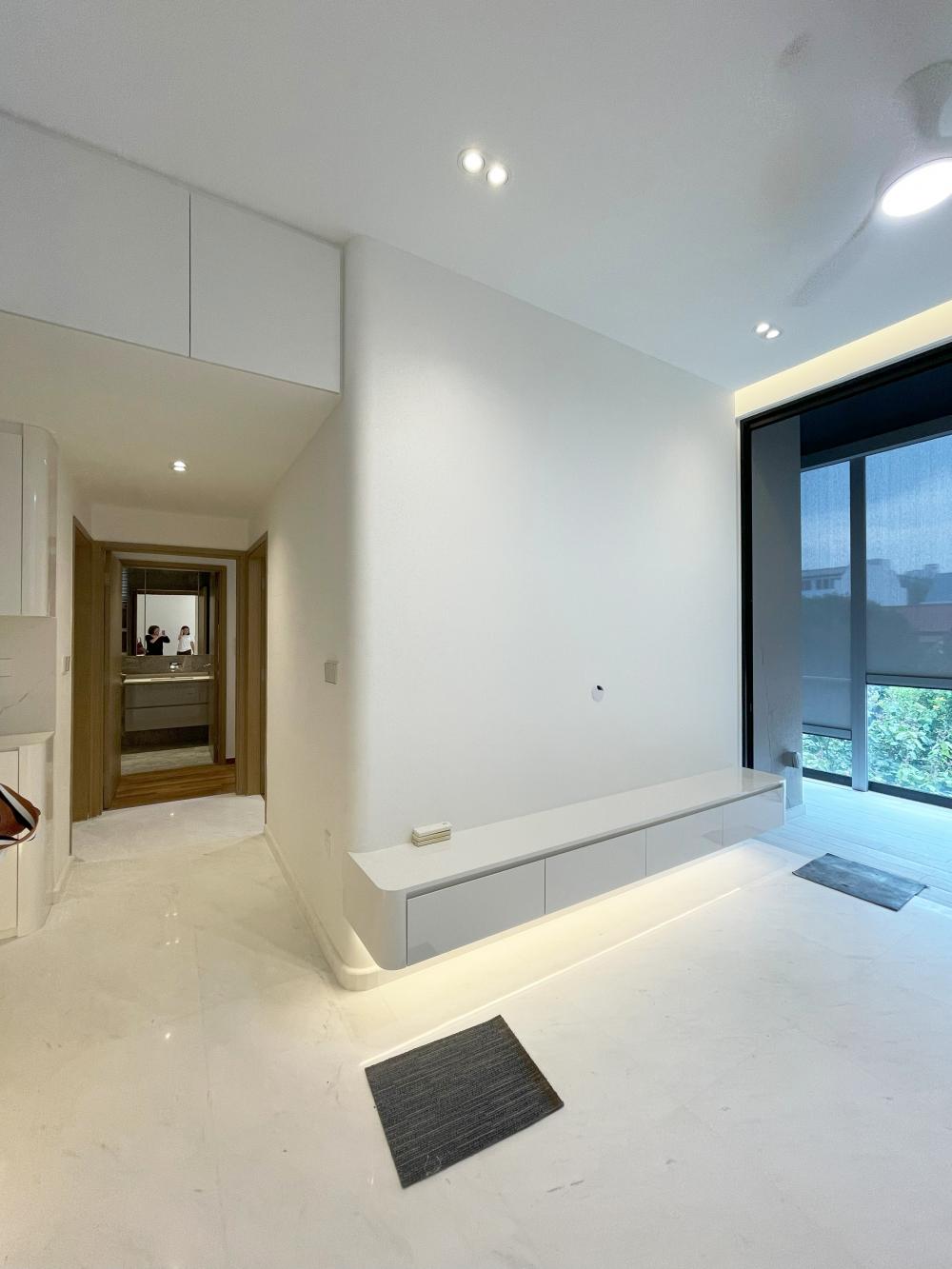 Modern Living Room with Bookshelf and Settee