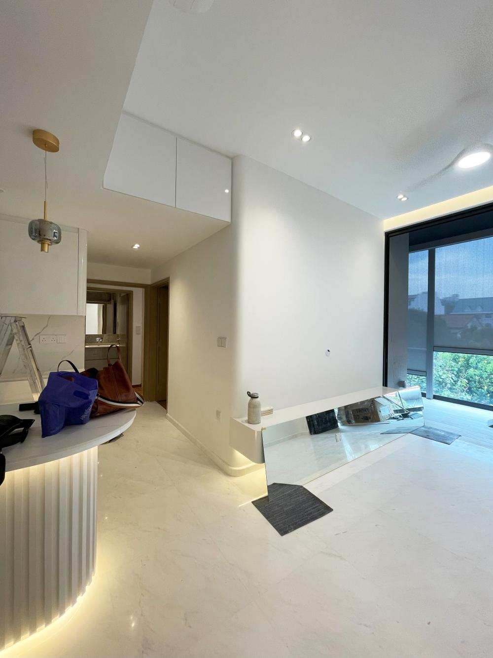 Modern Living Room with Bookshelf and Settee