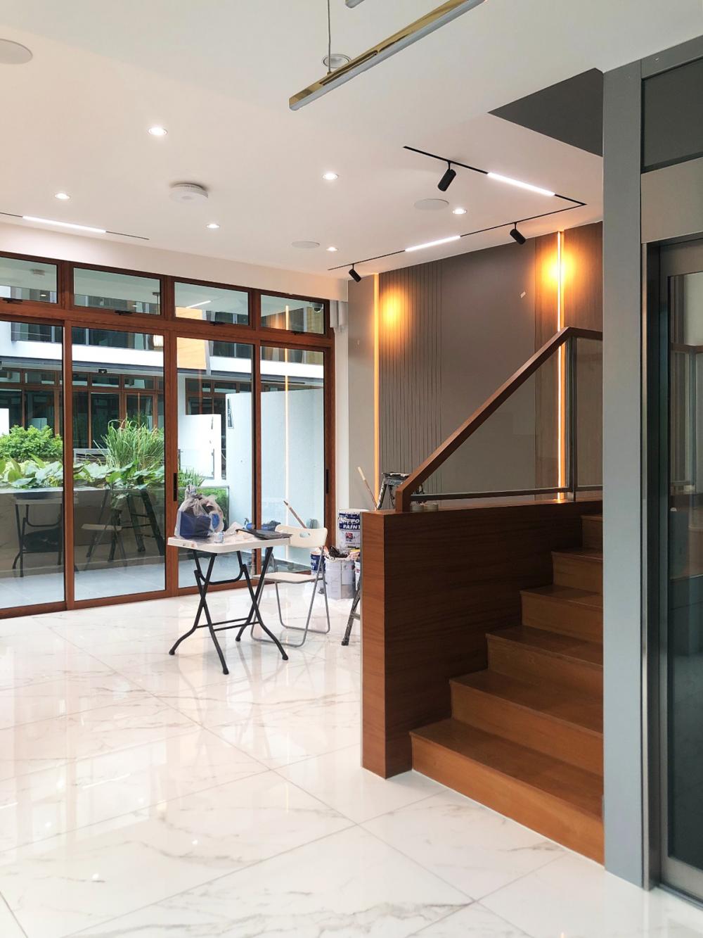 Modern Hallway with Bookshelf and Artwork
