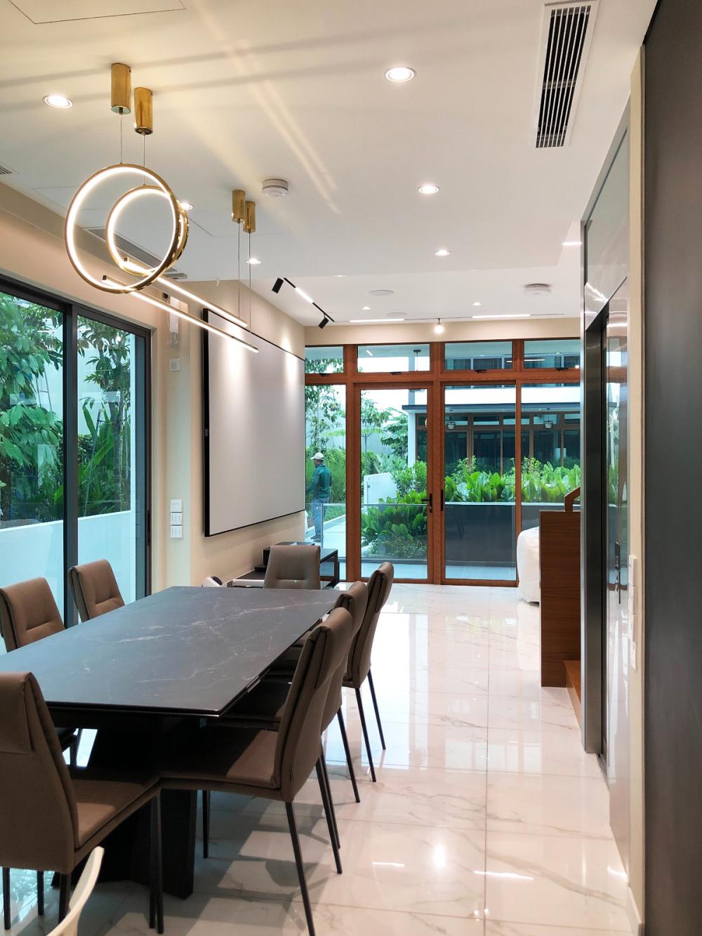 Modern Dining Room with Drop Light and Downlights