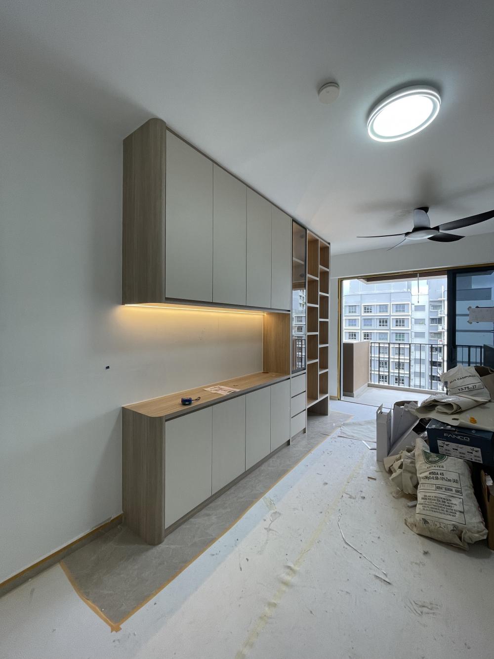 Modern Living Room with Bookshelf and Settee