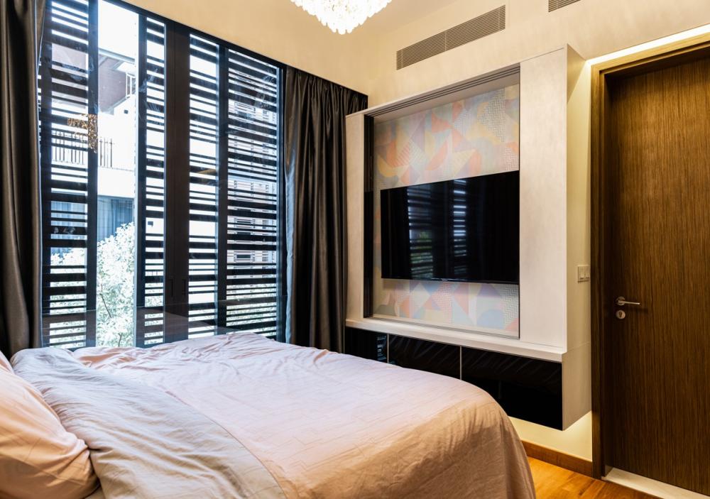 Transitional Bedroom with Cove Lighting and Chandelier