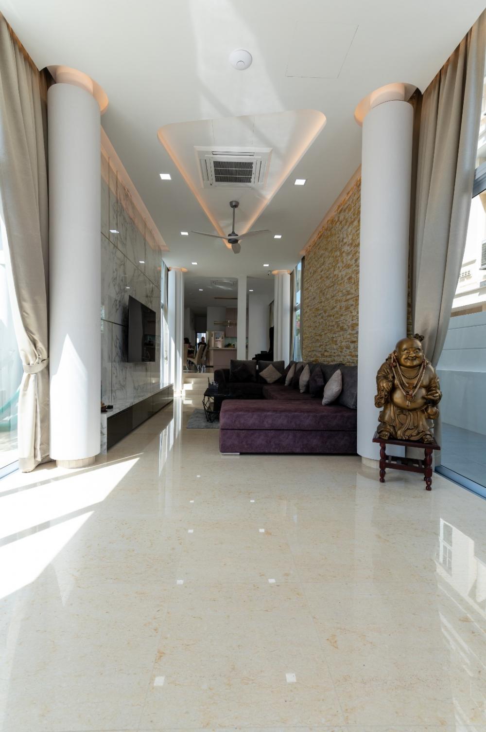 Transitional Living Room with Marble Floor and Feature Wall