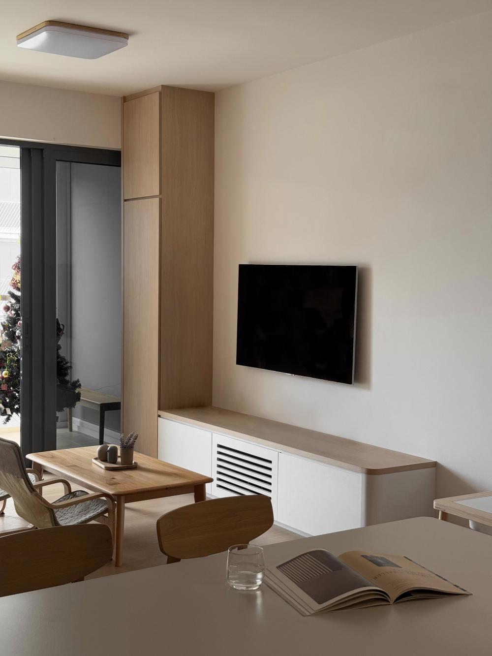 Scandinavian Living Room with Wood Flooring and TV Console