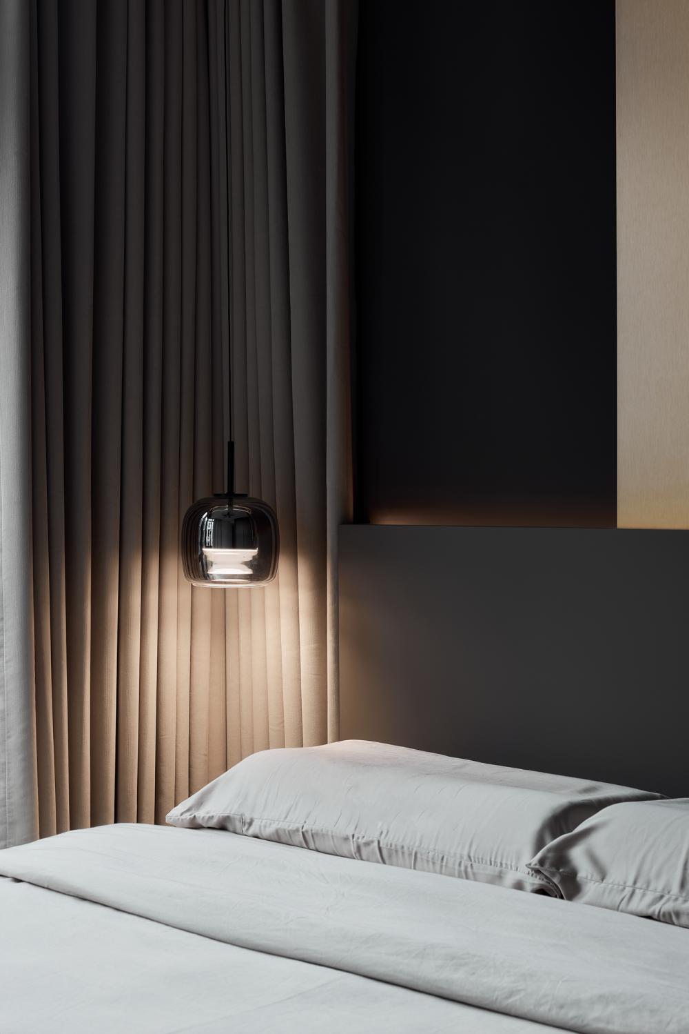 Modern Bedroom with Feature Wall and Drop Light