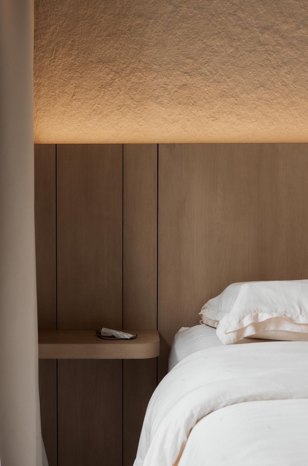 Scandinavian Bedroom with Feature Wall and Bedside Table
