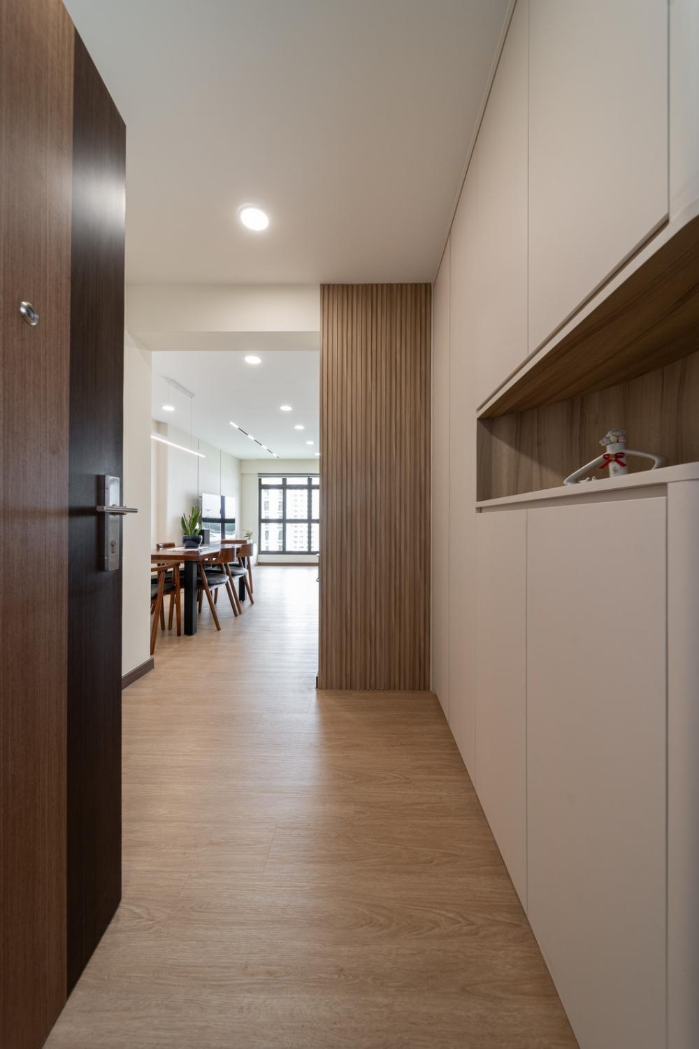 Minimalist Entryway with Seating Bench and Small Storage