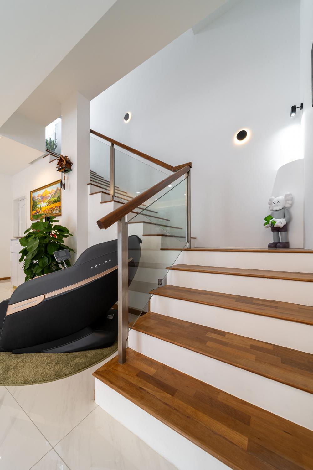Contemporary Hallway with Staircase and Artwork