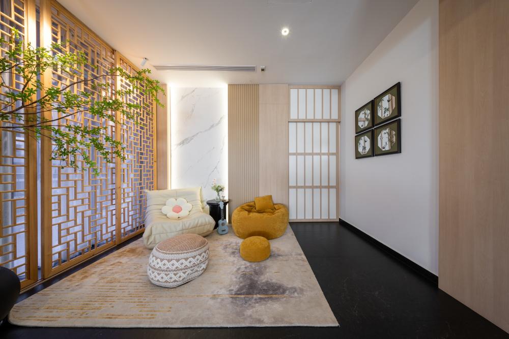 Asian Living Room with Feature Wall and Paintings
