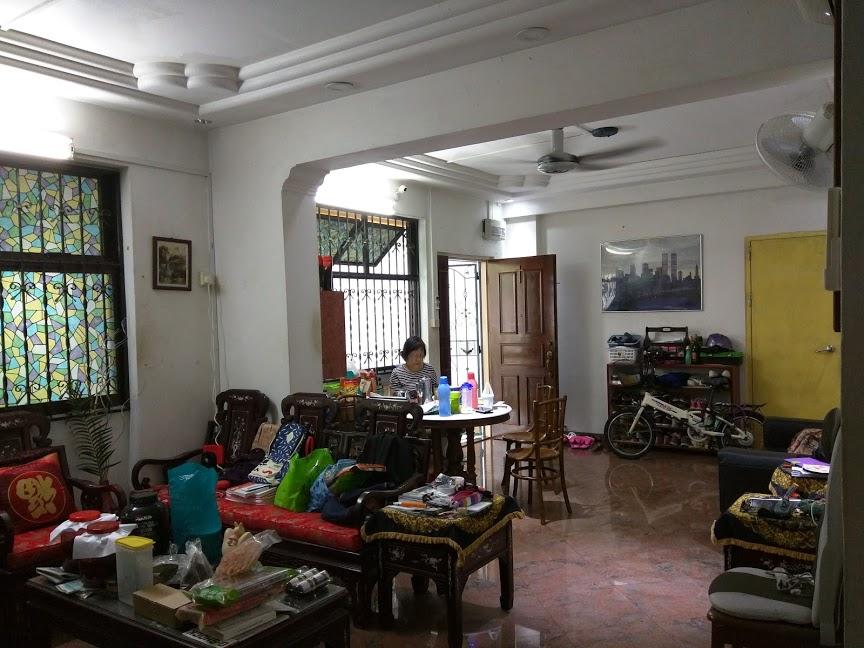 Asian Living Room with Bookshelf and Settee