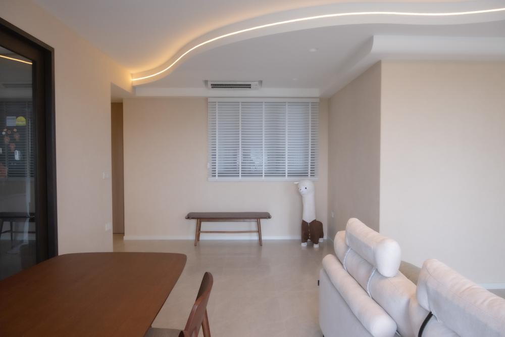 Minimalist Living Room with TV Console and Cove Lighting