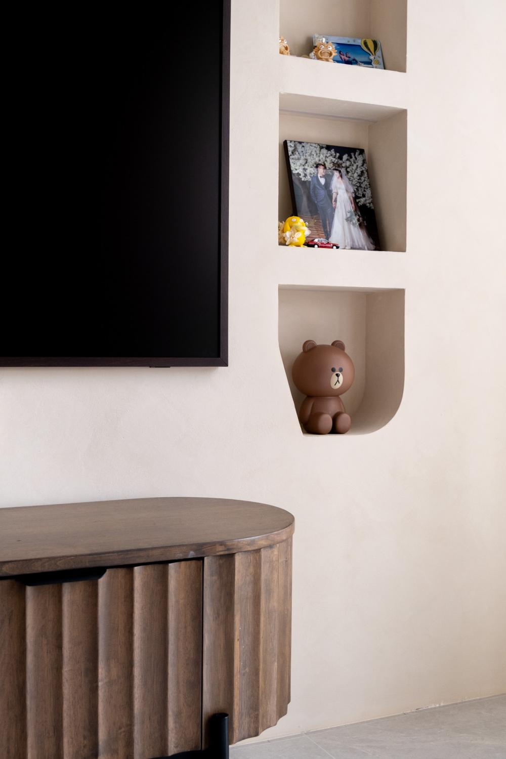 Minimalist Living Room with Feature Wall and Display Cabinets