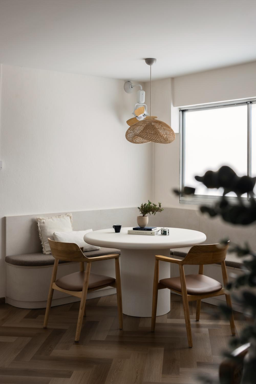 Scandinavian Dining Room with Herringbone Tiling and Wood Flooring