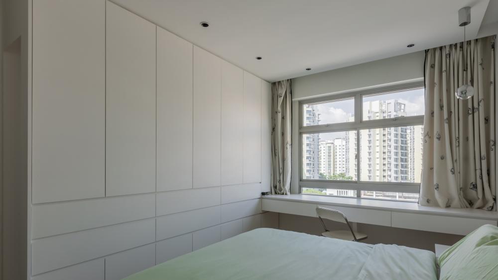 Minimalist Bedroom with Vinyl Flooring and Wardrobe