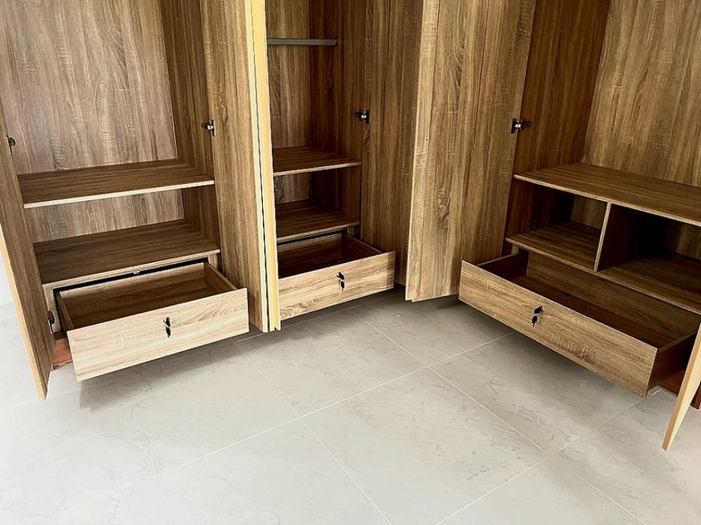 Modern Bedroom with Homogeneous Tiles and Wardrobe