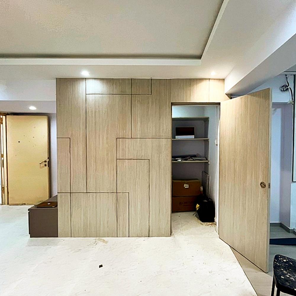 Modern Living Room with Homogeneous Tiles and Feature Wall