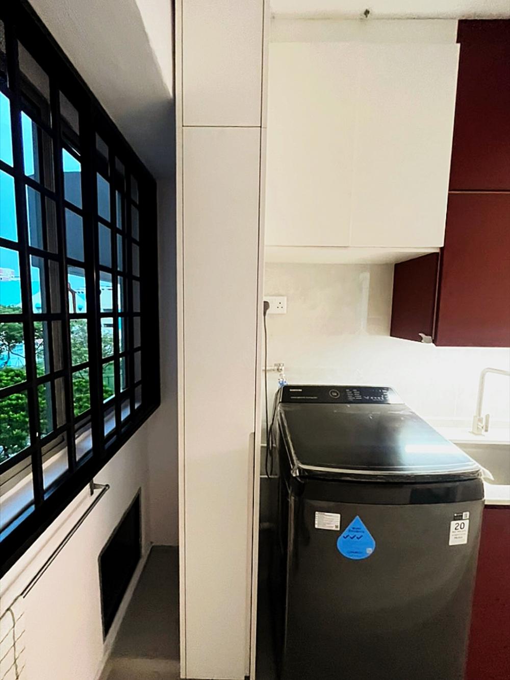 Modern Kitchen with Washing Machine and Kitchen Cabinets