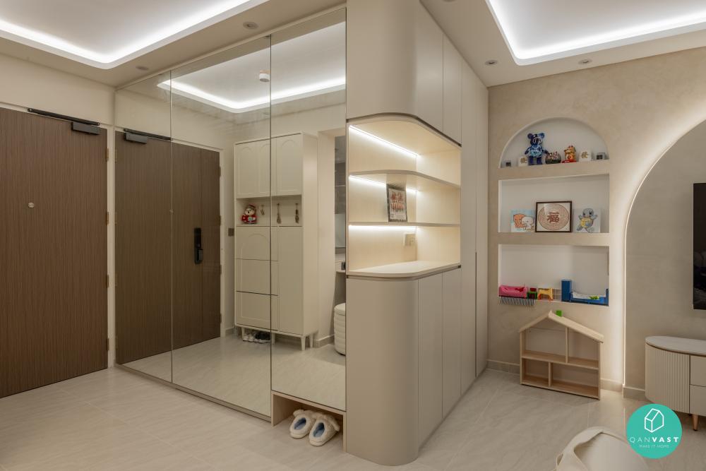 Minimalist Foyer with Mirror and Display Cabinets