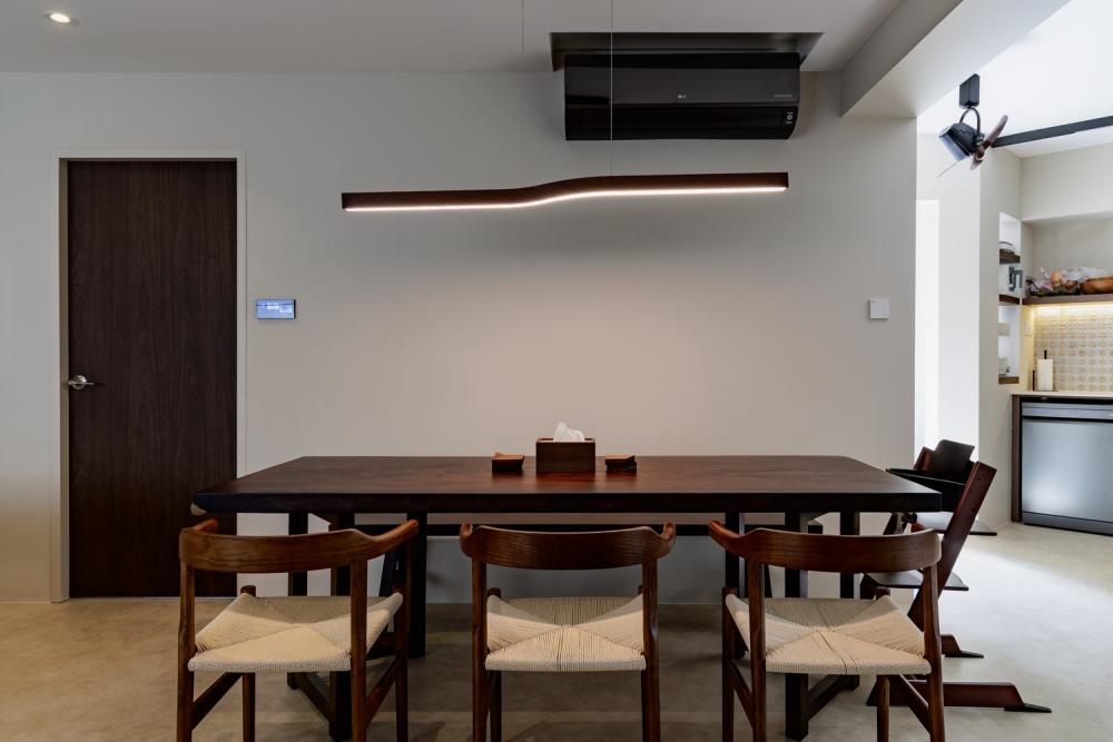 Contemporary Dining Room with Drop Light and Dining Table