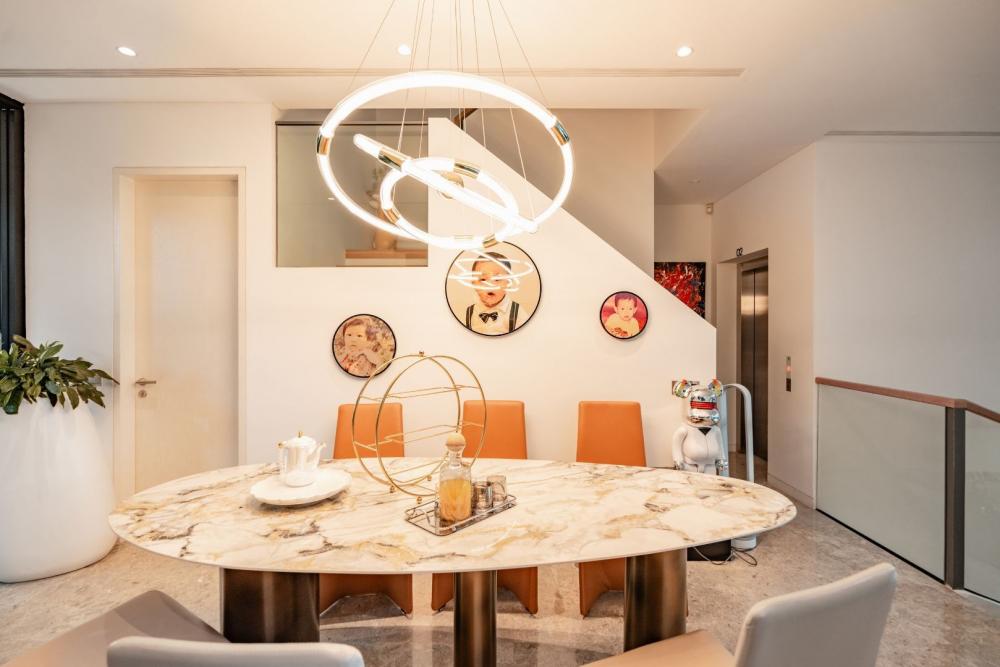Modern Dining Room with Chandelier and Lighting