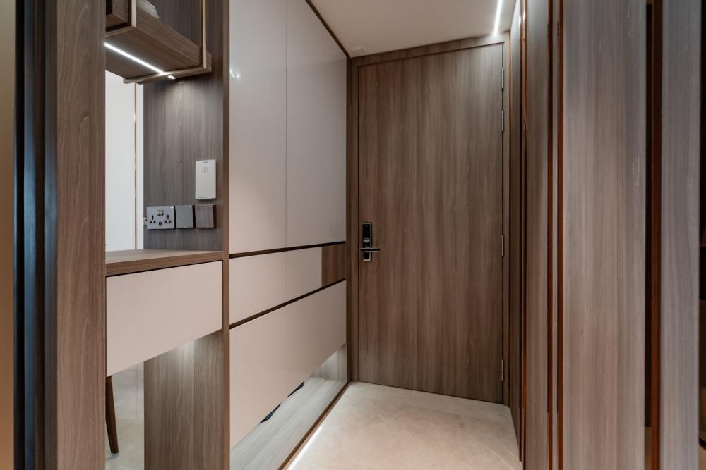 Modern Foyer with Storage Cabinets and Doors