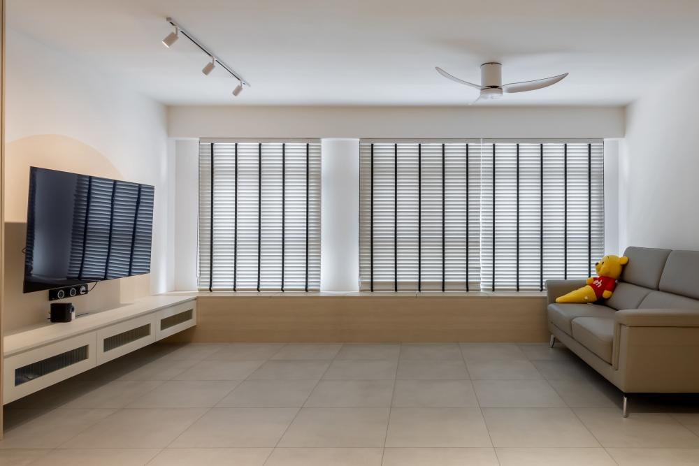 Scandinavian Living Room with Homogeneous Tiles and TV Console