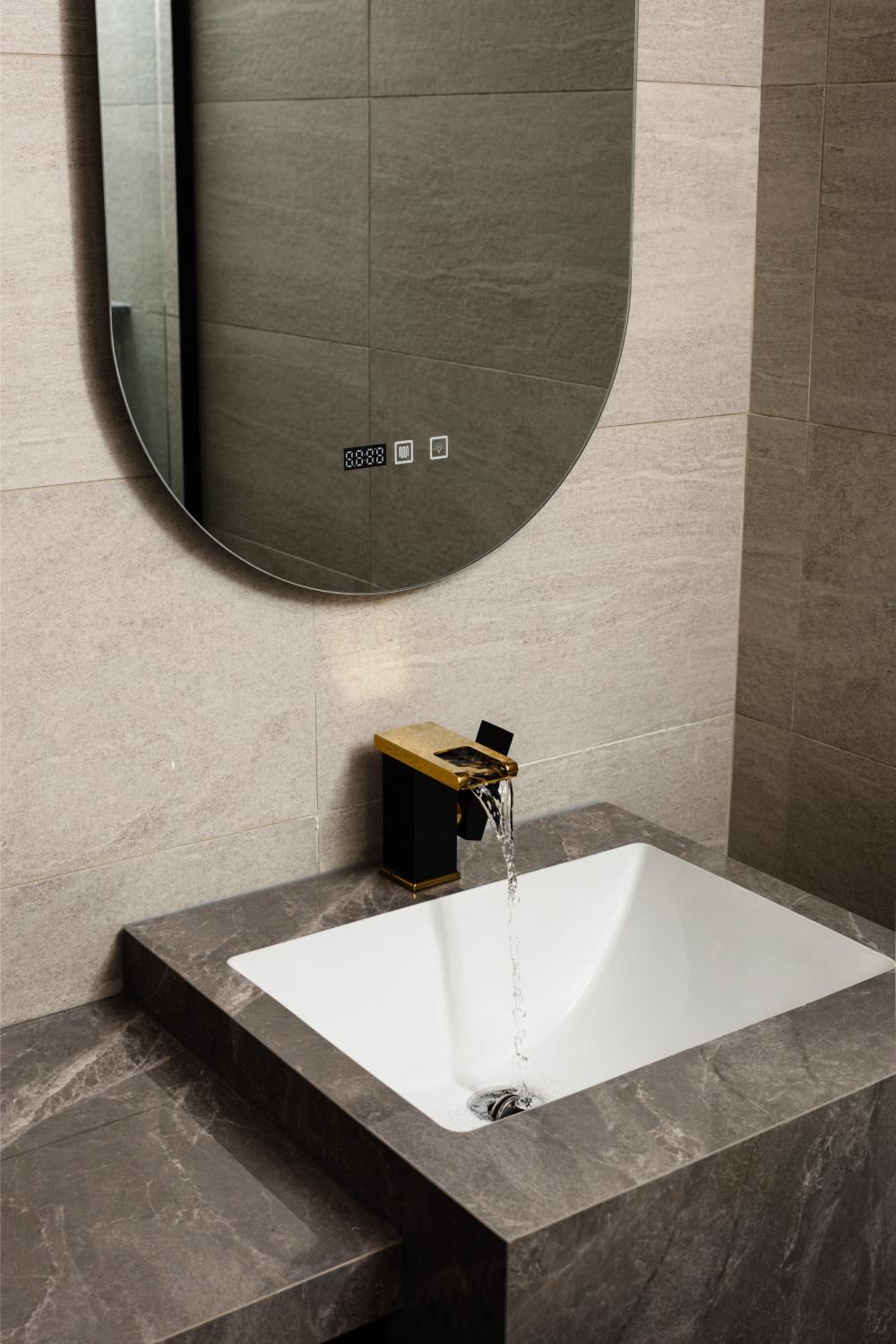 Minimalist Bathroom with Countertop and Mirror