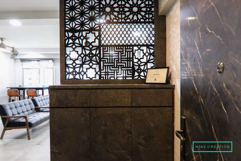 Industrial Entryway with Panelling and Sofa