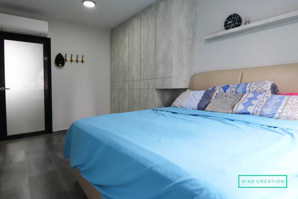 Industrial Bedroom with Homogeneous Tiles and Ceiling Light