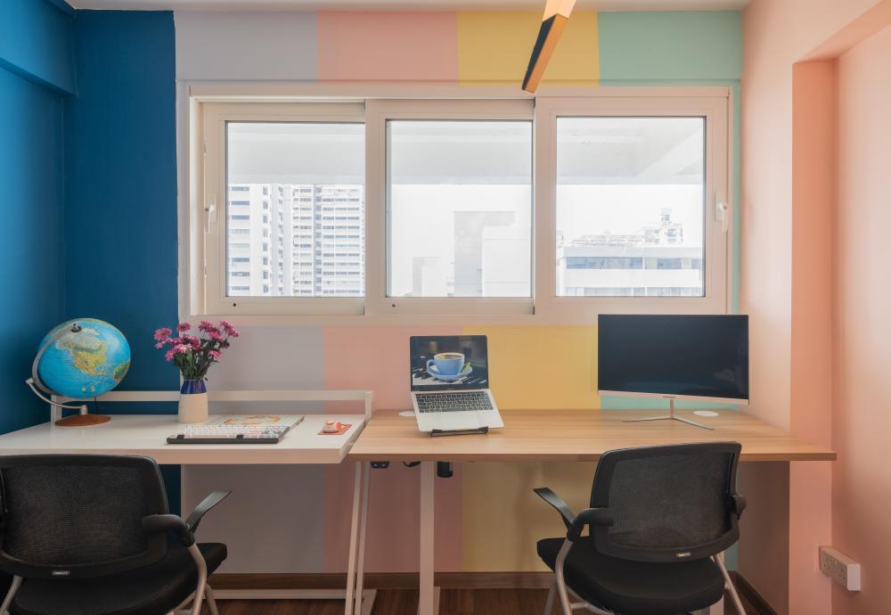 Contemporary Home Office with Bookshelf and Wallpaper